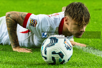 2024-11-15 - Nicola Zalewski of Poland during the UEFA Nations League, League phase, Matchday 5 football match between Portugal and Poland on 15 November 2024 at Estádio do Dragão in Porto, Portugal - FOOTBALL - UEFA NATIONS LEAGUE - PORTUGAL V POLAND - UEFA NATIONS LEAGUE - SOCCER