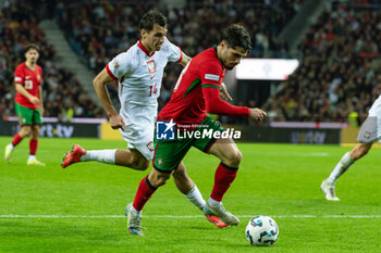 2024-11-15 - Pedro Neto of Portugal scores the fourth goal, Jakub Kiwior of Poland during the UEFA Nations League, League phase, Matchday 5 football match between Portugal and Poland on 15 November 2024 at Estádio do Dragão in Porto, Portugal - FOOTBALL - UEFA NATIONS LEAGUE - PORTUGAL V POLAND - UEFA NATIONS LEAGUE - SOCCER