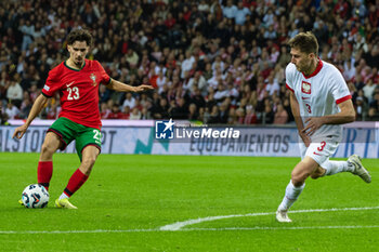 2024-11-15 - Vitinha of Portugal and Taras Romanczuk of Poland during the UEFA Nations League, League phase, Matchday 5 football match between Portugal and Poland on 15 November 2024 at Estádio do Dragão in Porto, Portugal - FOOTBALL - UEFA NATIONS LEAGUE - PORTUGAL V POLAND - UEFA NATIONS LEAGUE - SOCCER