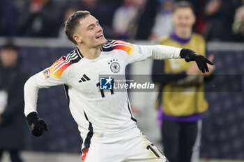 2024-11-16 - Florian Wirtz of Germany celebrates his goal 4-0 during the UEFA Nations League, League phase, Matchday 5 football match between Germany and Bosnia Herzegovina on 16 November 2024 at Europa-Park Stadion in Freiburg, Germany - FOOTBALL - UEFA NATIONS LEAGUE - GERMANY V BOSNIA HERZEGOVINA - UEFA NATIONS LEAGUE - SOCCER