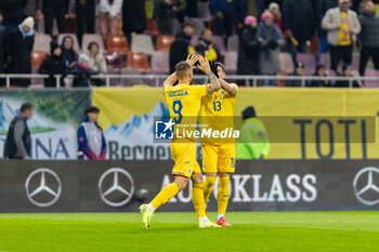 18/11/2024 - Daniel Birligea of Romania and Valentin Mihaila of Romania celebrating after the first goal during the UEFA Nations League, League C, Group C2 football match between Romania and Cyprus on 18 November 2024 at Arena Nationala in Bucharest, Romania - FOOTBALL - UEFA NATIONS LEAGUE - ROMANIA V CYPRUS - UEFA NATIONS LEAGUE - CALCIO