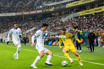 18/11/2024 - Razvan Marin of Romania and Stelios Andreou of Cyprus in action during the UEFA Nations League, League C, Group C2 football match between Romania and Cyprus on 18 November 2024 at Arena Nationala in Bucharest, Romania - FOOTBALL - UEFA NATIONS LEAGUE - ROMANIA V CYPRUS - UEFA NATIONS LEAGUE - CALCIO