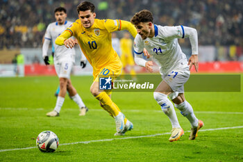 18/11/2024 - Ianis Hagi of Romania and Marinos Tzionis of Cyprus fighting for the ball during the UEFA Nations League, League C, Group C2 football match between Romania and Cyprus on 18 November 2024 at Arena Nationala in Bucharest, Romania - FOOTBALL - UEFA NATIONS LEAGUE - ROMANIA V CYPRUS - UEFA NATIONS LEAGUE - CALCIO