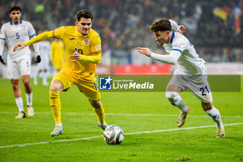 18/11/2024 - Ianis Hagi of Romania and Marinos Tzionis of Cyprus fighting for the ball during the UEFA Nations League, League C, Group C2 football match between Romania and Cyprus on 18 November 2024 at Arena Nationala in Bucharest, Romania - FOOTBALL - UEFA NATIONS LEAGUE - ROMANIA V CYPRUS - UEFA NATIONS LEAGUE - CALCIO