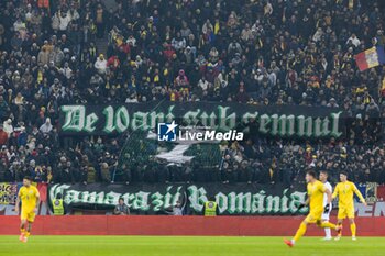 18/11/2024 - Romanian fans showing banners during the UEFA Nations League, League C, Group C2 football match between Romania and Cyprus on 18 November 2024 at Arena Nationala in Bucharest, Romania - FOOTBALL - UEFA NATIONS LEAGUE - ROMANIA V CYPRUS - UEFA NATIONS LEAGUE - CALCIO