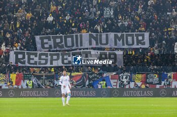 18/11/2024 - Romanian fans showing banners during the UEFA Nations League, League C, Group C2 football match between Romania and Cyprus on 18 November 2024 at Arena Nationala in Bucharest, Romania - FOOTBALL - UEFA NATIONS LEAGUE - ROMANIA V CYPRUS - UEFA NATIONS LEAGUE - CALCIO