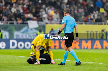 18/11/2024 - Florin Nita of Romania in pain after saving a ball during the UEFA Nations League, League C, Group C2 football match between Romania and Cyprus on 18 November 2024 at Arena Nationala in Bucharest, Romania - FOOTBALL - UEFA NATIONS LEAGUE - ROMANIA V CYPRUS - UEFA NATIONS LEAGUE - CALCIO