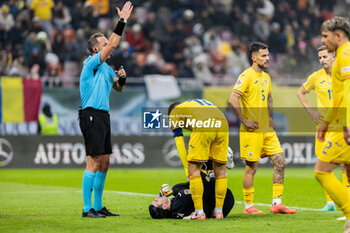 18/11/2024 - Referee Luca Pairetto of Italy calling the medical staff for Florin Nita of Romania during the UEFA Nations League, League C, Group C2 football match between Romania and Cyprus on 18 November 2024 at Arena Nationala in Bucharest, Romania - FOOTBALL - UEFA NATIONS LEAGUE - ROMANIA V CYPRUS - UEFA NATIONS LEAGUE - CALCIO