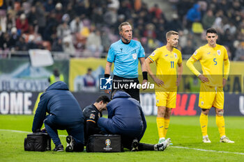 18/11/2024 - Florin Nita of Romania and the medical staff during the UEFA Nations League, League C, Group C2 football match between Romania and Cyprus on 18 November 2024 at Arena Nationala in Bucharest, Romania - FOOTBALL - UEFA NATIONS LEAGUE - ROMANIA V CYPRUS - UEFA NATIONS LEAGUE - CALCIO