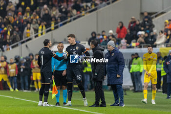 18/11/2024 - Stefan Tarnovanu of Romania changing Florin Nita of Romania after he got injured during the UEFA Nations League, League C, Group C2 football match between Romania and Cyprus on 18 November 2024 at Arena Nationala in Bucharest, Romania - FOOTBALL - UEFA NATIONS LEAGUE - ROMANIA V CYPRUS - UEFA NATIONS LEAGUE - CALCIO