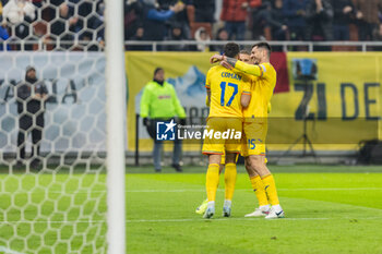 18/11/2024 - Andrei Burca of Romania andFlorinel Coman of Romania celebrate scoring his team's fourth goal to make the score during the UEFA Nations League, League C, Group C2 football match between Romania and Cyprus on 18 November 2024 at Arena Nationala in Bucharest, Romania - FOOTBALL - UEFA NATIONS LEAGUE - ROMANIA V CYPRUS - UEFA NATIONS LEAGUE - CALCIO