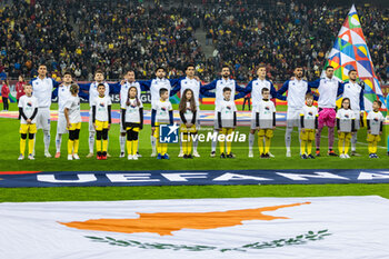 18/11/2024 - Cyprus squad during their National Anthem during the UEFA Nations League, League C, Group C2 football match between Romania and Cyprus on 18 November 2024 at Arena Nationala in Bucharest, Romania - FOOTBALL - UEFA NATIONS LEAGUE - ROMANIA V CYPRUS - UEFA NATIONS LEAGUE - CALCIO