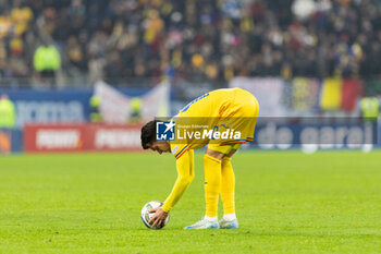 18/11/2024 - Ianis Hagi of Romania arranging the ball before a free kick during the UEFA Nations League, League C, Group C2 football match between Romania and Cyprus on 18 November 2024 at Arena Nationala in Bucharest, Romania - FOOTBALL - UEFA NATIONS LEAGUE - ROMANIA V CYPRUS - UEFA NATIONS LEAGUE - CALCIO