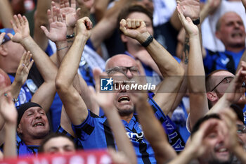 2024-08-14 - Atalanta fans during the UEFA Super Cup 2024 football match between Real Madrid CF and Atalanta BC on 14 August 2024 at PGE Narodowy in Warsaw, Poland - FOOTBALL - UEFA SUPER CUP 2024 - REAL MADRID V ATALANTA - UEFA SUPER CUP - SOCCER