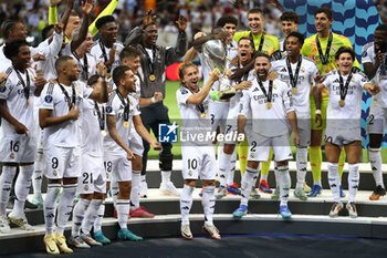 2024-08-14 - Luka Modric, Lucas Vazquez, Dani Carvajal, Rodrygo of Real Madrid during the UEFA Super Cup 2024 football match between Real Madrid CF and Atalanta BC on 14 August 2024 at PGE Narodowy in Warsaw, Poland - FOOTBALL - UEFA SUPER CUP 2024 - REAL MADRID V ATALANTA - UEFA SUPER CUP - SOCCER