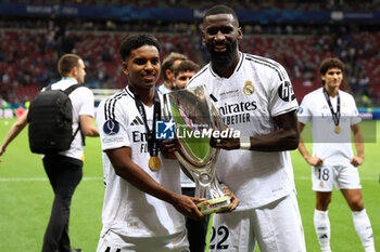 2024-08-14 - Rodrygo, Antonio Rudiger of Real Madrid during the UEFA Super Cup 2024 football match between Real Madrid CF and Atalanta BC on 14 August 2024 at PGE Narodowy in Warsaw, Poland - FOOTBALL - UEFA SUPER CUP 2024 - REAL MADRID V ATALANTA - UEFA SUPER CUP - SOCCER