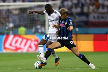 2024-08-14 - Antonio Rudiger of Real Madrid and Charles De Ketelaere of Atalanta during the UEFA Super Cup 2024 football match between Real Madrid CF and Atalanta BC on 14 August 2024 at PGE Narodowy in Warsaw, Poland - FOOTBALL - UEFA SUPER CUP 2024 - REAL MADRID V ATALANTA - UEFA SUPER CUP - SOCCER