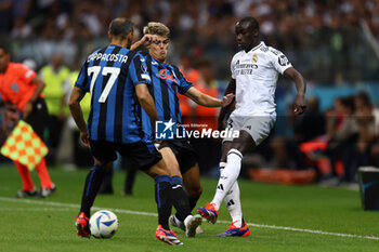 2024-08-14 - Charles De Ketelaere of Atalanta and Ferland Mendy of Real Madrid during the UEFA Super Cup 2024 football match between Real Madrid CF and Atalanta BC on 14 August 2024 at PGE Narodowy in Warsaw, Poland - FOOTBALL - UEFA SUPER CUP 2024 - REAL MADRID V ATALANTA - UEFA SUPER CUP - SOCCER