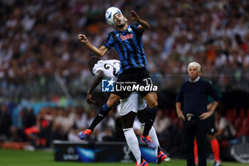 2024-08-14 - Ferland Mendy of Real Madrid and Davide Zappacosta of Atalanta during the UEFA Super Cup 2024 football match between Real Madrid CF and Atalanta BC on 14 August 2024 at PGE Narodowy in Warsaw, Poland - FOOTBALL - UEFA SUPER CUP 2024 - REAL MADRID V ATALANTA - UEFA SUPER CUP - SOCCER