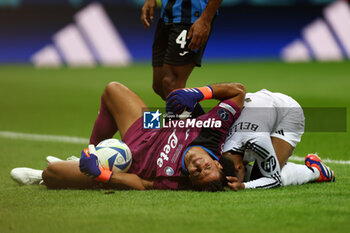 2024-08-14 - Juan Musso of Atalanta and Jude Bellingham of Real Madrid during the UEFA Super Cup 2024 football match between Real Madrid CF and Atalanta BC on 14 August 2024 at PGE Narodowy in Warsaw, Poland - FOOTBALL - UEFA SUPER CUP 2024 - REAL MADRID V ATALANTA - UEFA SUPER CUP - SOCCER