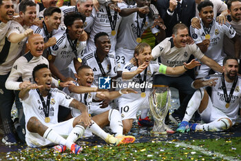 2024-08-14 - Kylian Mbappe, Vinicius Junior, Luka Modric of Real Madrid during the UEFA Super Cup 2024 football match between Real Madrid CF and Atalanta BC on 14 August 2024 at PGE Narodowy in Warsaw, Poland - FOOTBALL - UEFA SUPER CUP 2024 - REAL MADRID V ATALANTA - UEFA SUPER CUP - SOCCER