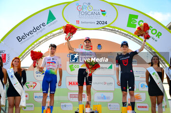 2024-09-11 - The podium of Giro della Toscana Winner Champoussin Clement FRA - (Arkea ) Second place Michael Storer(Tudor) third place Jegat Jordan FRA (Total Energie) - GIRO DELLA TOSCANA - STREET - CYCLING