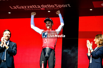 2024-05-08 - FRA Benjamin Thomas -COF Winner of the Genova- Lucca Stage on the podium - STAGE 5 - GENOVA-LUCCA - GIRO D'ITALIA - CYCLING