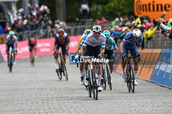 2024-05-05 - the group reaches to finih line of San Francesco Al Campo (TO)-Santuario di Oropa (BI) - Stage 2 of Giro D'Italia 2024 - STAGE 2 - S.FRANCESCO AL CAMPO-SANTUARIO DI OROPA - GIRO D'ITALIA - CYCLING