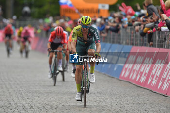 05/05/2024 - the group reaches to finih line of San Francesco Al Campo (TO)-Santuario di Oropa (BI) - Stage 2 of Giro D'Italia 2024 - STAGE 2 - S.FRANCESCO AL CAMPO-SANTUARIO DI OROPA - GIRO D'ITALIA - CICLISMO