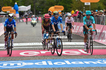 2024-05-05 - the group reaches to finih line of San Francesco Al Campo (TO)-Santuario di Oropa (BI) - Stage 2 of Giro D'Italia 2024 - STAGE 2 - S.FRANCESCO AL CAMPO-SANTUARIO DI OROPA - GIRO D'ITALIA - CYCLING