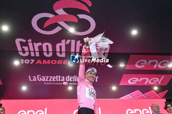 05/05/2024 - Tadej Pogacar wears the Maglia Rosa after San Francesco Al Campo (TO)-Santuario di Oropa (BI) - Stage 2 of Giro D'Italia 2024 - STAGE 2 - S.FRANCESCO AL CAMPO-SANTUARIO DI OROPA - GIRO D'ITALIA - CICLISMO
