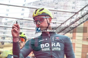 2024-05-07 - Bora Hansgrohe on the signature podium Tappa 4 - Acqui Terme-Andora - Giro d'Italia 2024 - STAGE 4 - AQUI TERME-ANDORA - GIRO D'ITALIA - CYCLING
