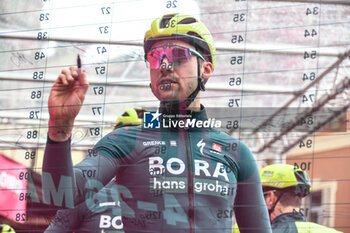 2024-05-07 - Bora Hansgrohe on the signature podium Tappa 4 - Acqui Terme-Andora - Giro d'Italia 2024 - STAGE 4 - AQUI TERME-ANDORA - GIRO D'ITALIA - CYCLING