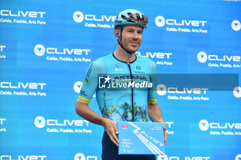 2024-05-07 - Astana Qazaqstan Team on the signature podium Tappa 4 - Acqui Terme-Andora - Giro d'Italia 2024 - STAGE 4 - AQUI TERME-ANDORA - GIRO D'ITALIA - CYCLING