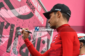 2024-05-07 - Cofidis Team on the signature podium Tappa 4 - Acqui Terme-Andora - Giro d'Italia 2024 - STAGE 4 - AQUI TERME-ANDORA - GIRO D'ITALIA - CYCLING