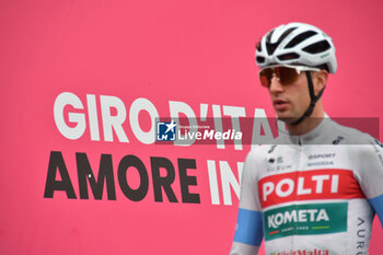 07/05/2024 - Team Polti Kometa on the signature podium Tappa 4 - Acqui Terme-Andora - Giro d'Italia 2024 - STAGE 4 - AQUI TERME-ANDORA - GIRO D'ITALIA - CICLISMO