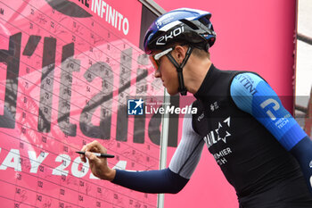 07/05/2024 - Israel Premier Tech on the signature podium Tappa 4 - Acqui Terme-Andora - Giro d'Italia 2024 - STAGE 4 - AQUI TERME-ANDORA - GIRO D'ITALIA - CICLISMO