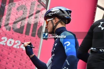 07/05/2024 - Israel Premier Tech on the signature podium Tappa 4 - Acqui Terme-Andora - Giro d'Italia 2024 - STAGE 4 - AQUI TERME-ANDORA - GIRO D'ITALIA - CICLISMO