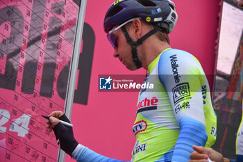 07/05/2024 - Intermarche Wanty on the signature podium Tappa 4 - Acqui Terme-Andora - Giro d'Italia 2024 - STAGE 4 - AQUI TERME-ANDORA - GIRO D'ITALIA - CICLISMO