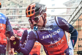07/05/2024 - Team Jayco Alula on the signature podium Tappa 4 - Acqui Terme-Andora - Giro d'Italia 2024 - STAGE 4 - AQUI TERME-ANDORA - GIRO D'ITALIA - CICLISMO