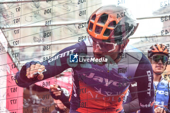 07/05/2024 - Team Jayco Alula on the signature podium Tappa 4 - Acqui Terme-Andora - Giro d'Italia 2024 - STAGE 4 - AQUI TERME-ANDORA - GIRO D'ITALIA - CICLISMO