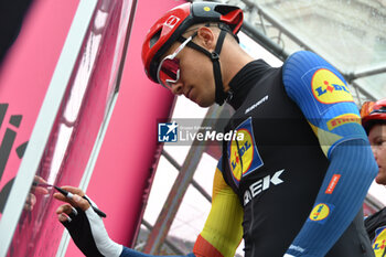 2024-05-07 - Jonathan Milan of Lidl Trek on the signature podium Tappa 4 - Acqui Terme-Andora - Giro d'Italia 2024 - STAGE 4 - AQUI TERME-ANDORA - GIRO D'ITALIA - CYCLING