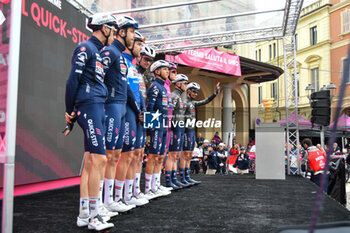 07/05/2024 - Soudal Quick-Step on the signature podium Tappa 4 - Acqui Terme-Andora - Giro d'Italia 2024 - STAGE 4 - AQUI TERME-ANDORA - GIRO D'ITALIA - CICLISMO