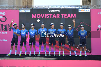 2024-05-08 - Team presentation on signature podium Tappa 5 - Genova-Lucce - Giro d'Italia 2024 - STAGE 5 - GENOVA-LUCCA - GIRO D'ITALIA - CYCLING