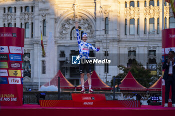 2024-09-08 - Jay Vine of Australia and UAE Team Emirates celebrates at podium as Polka Dot Mountain Jersey winner at the end of the 79th Tour of Spain 2024 - Stage 21 on September 8, 2024 in Madrid, Spain. - LA VUELTA 2024: ETAPA 21 - SPANISH LA VUELTA - CYCLING