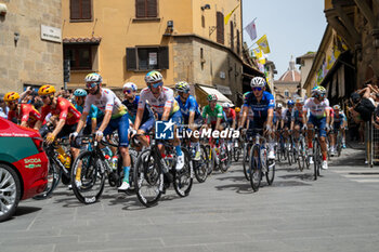 2024-06-29 - The pack of riders cycles on Ponte Vecchio - STAGE 1 - START - TOUR DE FRANCE - CYCLING