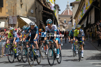 2024-06-29 - The pack of riders cycles on Ponte Vecchio - STAGE 1 - START - TOUR DE FRANCE - CYCLING