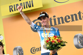 2024-06-29 - ROMAIN BARDET CELEBRATED ON THE PODIUM FOR THE WIN OF THE FIRST STAGE OF THE TOUR DE FRANCE 2024 IN RIMINI - STAGE 1 - FINISH - TOUR DE FRANCE - CYCLING