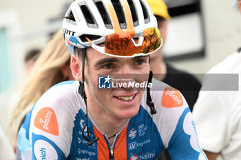 2024-06-29 - ROMAIN BARDET portrait celebrating the WIN THE FIRST STAGE OF THE TOUR DE FRANCE 2024 IN RIMINI - STAGE 1 - FINISH - TOUR DE FRANCE - CYCLING