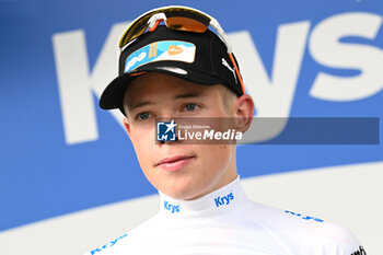 2024-06-29 - FRANK VAN DEN BROEK SMAILING PORTRAIT ON THE PODIUM WITH A WHITE JEUNE JERSEY - STAGE 1 - FINISH - TOUR DE FRANCE - CYCLING